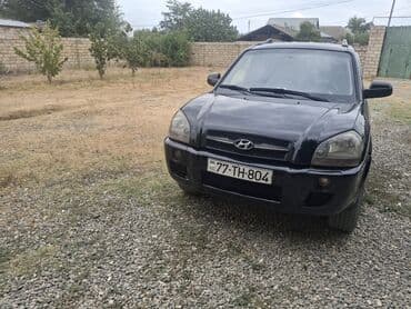 купить чехлы на авто: Hyundai Tucson: 0.2 л | 2005 г. Внедорожник — 1