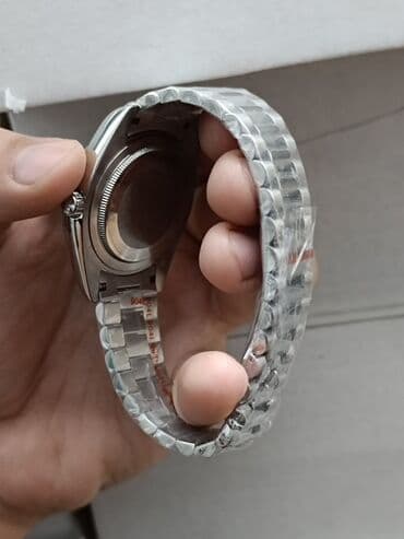 richard mille saat qiymeti: Rolex Day-Date — 2