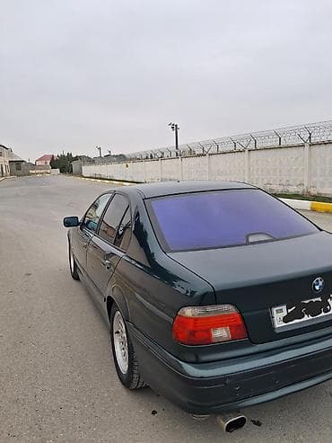 disqi teker mersedes: BMW 5 series: 2.8 l | 1997 il Sedan — 2