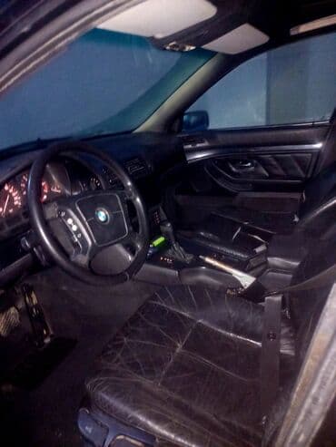 pilus masin: BMW 325: 2 l | 1998 il Sedan — 4