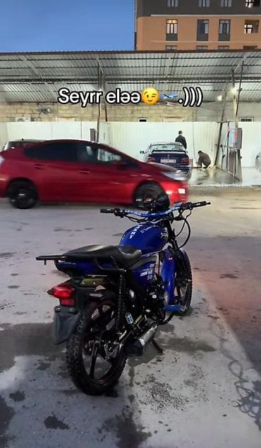 Moped/motosiklet – şəhər içi sürüşlər üçün yığcam və qənaətli model