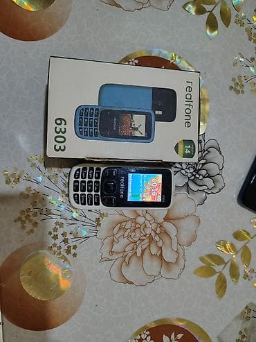 data modem sim card: - Model: Realfone 6303 (qutusu ilə) - Şəbəkə: Dual SIM - Ekran: rəngli — 5