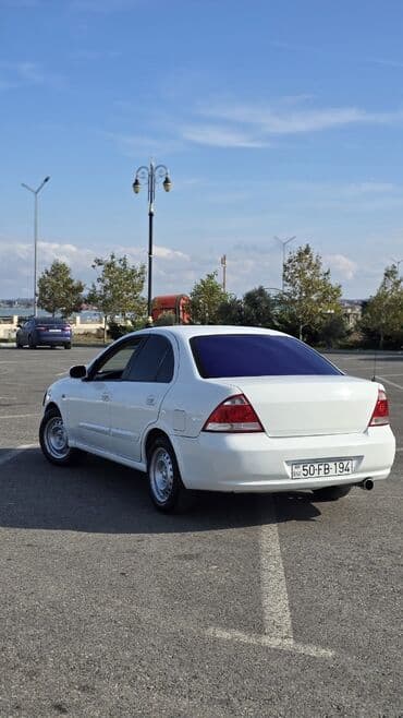 опель зафира а: Nissan Almera Classic: 1 l | 2007 il Sedan — 7
