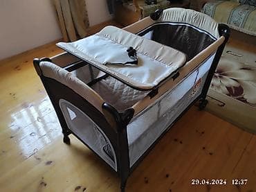 Uşaq üçün qatlanan çarpayı-maneyə (playpen) və alt dəyişmə masası — 2