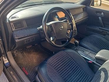 man sat: Nissan Teana – qara rəngli, geniş və komfortlu sedan. Xüsusiyyətlər — 5
