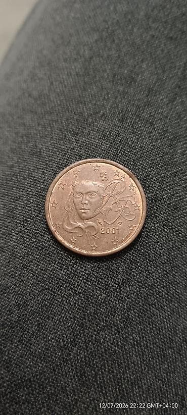 gitara simi: Məhsul: Avro sikkəsi – 5 Euro Cent (2001) Təsvir: - Nominal: 5 cent — 1