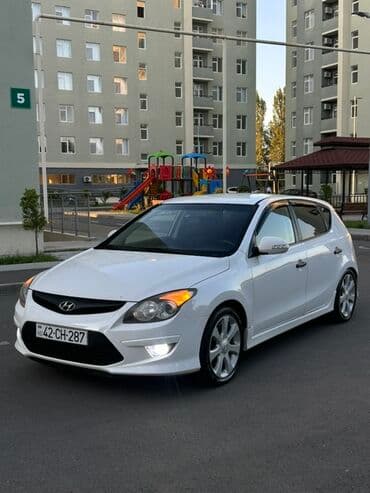 çaşqa feredo: Hyundai i30: 1.6 л | 2011 г. Хэтчбэк — 5