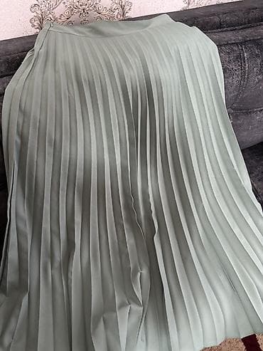 stapel parcalar: Brend: Özmenler Model: Plisəli ətək Bədən ölçüsü: 40 Rəng: Açıq — 2