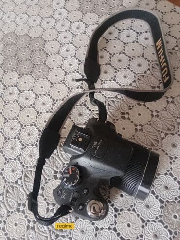 canon 1300d qiymeti: Hec bir problemi yoxdu,ustunde adaptoru diski var — 1