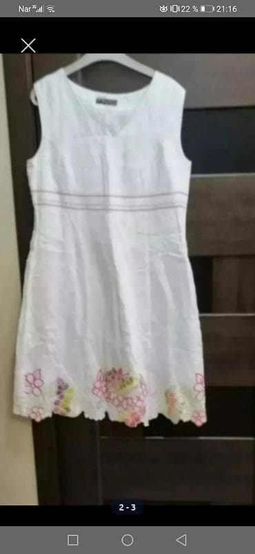 Kətan paltar. Materialı çox yumuşaqdır. 40 razmerə uyğundur