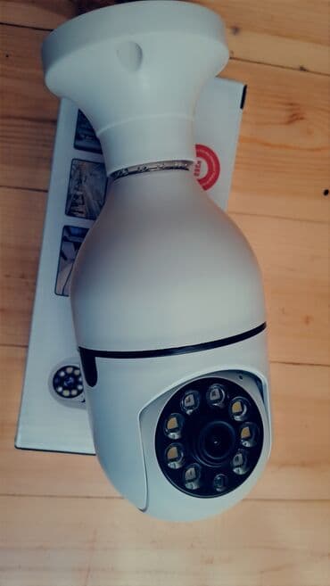 uşaq izleme kamerasi: V380 modeli ilə təchiz edilmiş bu ağ rəngli ağıllı şəbəkə kamerası — 1