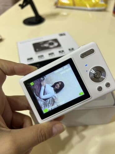 фотоаппарат зенит цена продать: Rəqəmsal fotoaparat – kompakt ağ korpus Xüsusiyyətlər: - 4K Mega — 4