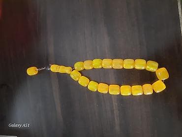 Sarı rəngli təsbeh - Material: sarı tonlarda, yarışəffaf, parlaq