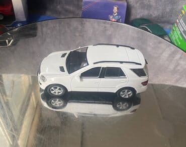 metbex tavan modelleri: Коллекционная модель Mercedes-Benz ML500 W164 white 2007 DeAgostini — 9