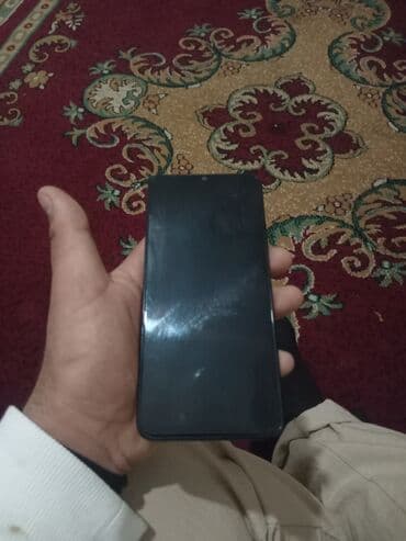 sogan ceken: Oppo A38, 128 GB, rəng - Qara — 2