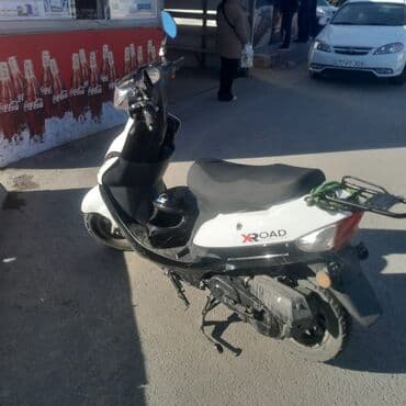 Proton: X-ROAD skuter - Rəng: ağ/qara - Korpusda “X-ROAD” loqosu - 2 nəfərlik — 6