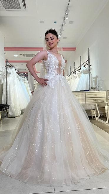 Qadın geyimləri: Məhsul: Gəlinliklər və aksesuarları Təsvir: - Müxtəlif üslubda — 10