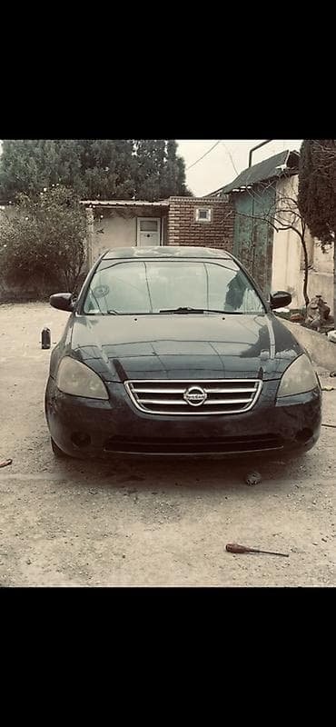 Nissan Altima: 2.5 l | 2005 il Sedan — 4