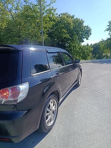 man sat: Mitsubishi Airtrek: 2 l | 2002 il 258000 km Van/Minivan — 4