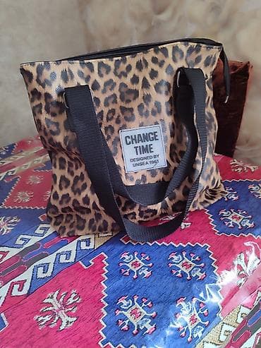 gucci sumkalar: Boyuk geni canta.Leopar naxışlı tote çanta. - Brend yazısı ön — 2