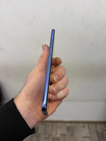 isti: Xiaomi Mi 9, 64 GB, rəng - Mavi, 
 Barmaq izi — 4