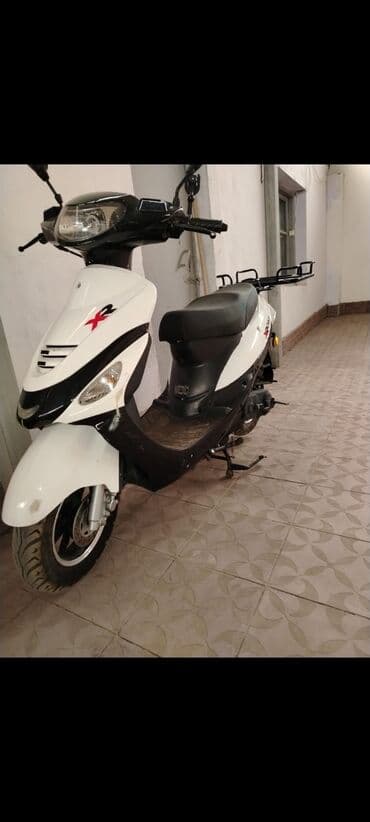 Şəhər daxili rahat hərəkət üçün skuter/moped. Matacikel