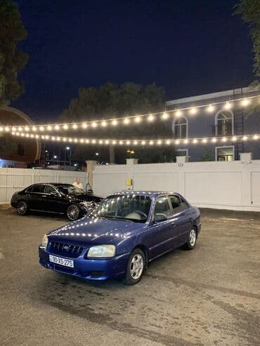 Hyundai Accent: 1.6 l | 2001 il Sedan — 7