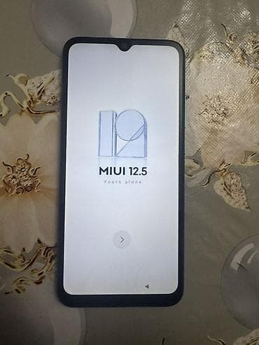 Бытовая техника: Redmi 9A, 32 ГБ, цвет - Голубой, Две SIM карты — 3