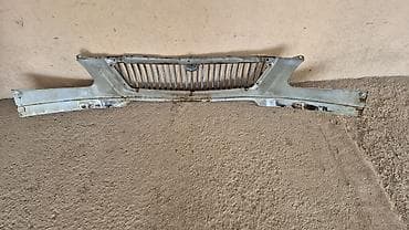 muravey ehtiyat hisseleri: Məhsul: QAZ “Volqa” üçün ön radiator barmaqlığı paneli (emblemlə) — 2