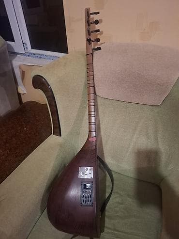 Elektrik saz – elektroakustik modifikasiya - Korpus: ağacdan