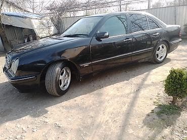 maşin niva: Mercedes-Benz E‑Class (W210) sedan, qara rəng. Xüsusiyyətlər: - — 5