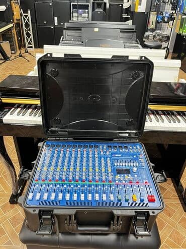 ses yazan cihazlar: Portativ qara çamadan içərisində yerləşən bu audio mikser, səslərin — 4