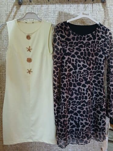 don şəkilləri: İki xanım donu seti. Birlikdə satılır 1) Açıq krem rəngli, qolsuz — 2