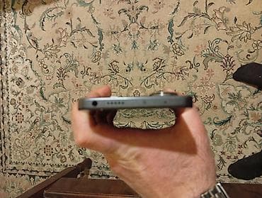 redmi not 13 pro qiyməti: Redmi smartfon - Model: Redmi (arxa korpusda “Redmi” loqosu). - Arxa — 5