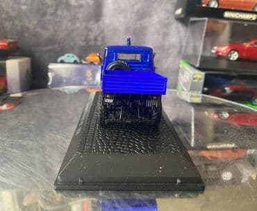 metbex tavan modelleri: Коллекционная модель Mercedes-Benz Unimog U411 Technical Relief blue — 15