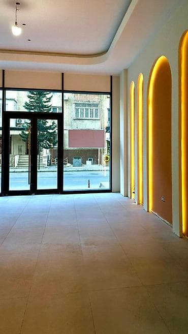 aşağda: Kooperasiya universitetinin yanında, əsas yola baxan, ümumi sahəsi 103 — 4