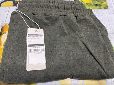 Спортивные брюки - комбаты.Абсолютно новые .Тёмно - зеленого цвета