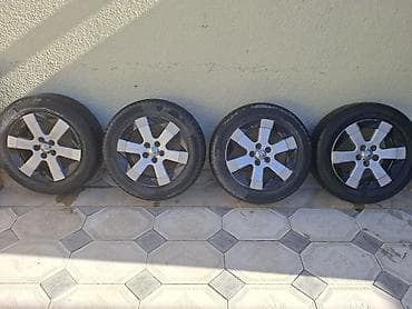 teker 18 type 1: Prius 20 kuza zavod 15lik disk təkərlər satılır.Təkərlərin ölçüləri — 1