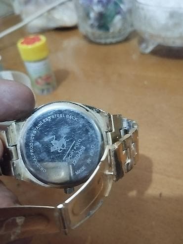 polo saat: Qol saatı, rəng - Qızılı — 1