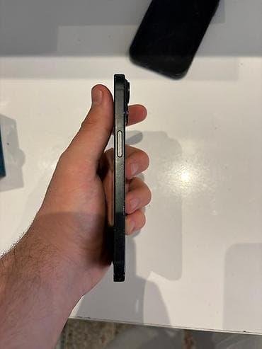 plazma 82: IPhone 15, 128 GB, Qara, Face ID — 1