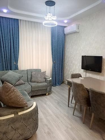 Kirayə verilir – tam mebelli 2 otaqlı mənzil - Geniş qonaq otağı