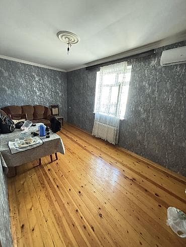 2 otaqlı mənzil – işıqlı, geniş zal və yataq otağı ilə Xüsusiyyətlər — 2