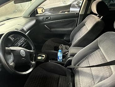 1 64: Volkswagen Passat: 1.8 l | Sedan — 3