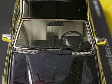 metbex tavan modelleri: Коллекционная модель Mercedes-Benz 200 W123 Hearse black 1982 Schuco — 14