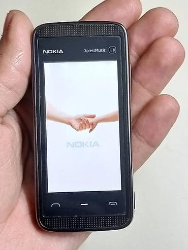 dark souls disk: Nokia 5530 Xpressmusic, 64 GB, rəng - Qara, Sensor — 1