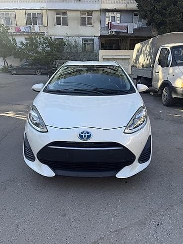 Toyota Aqua Hybrid, ağ rəng, 5 qapılı hatchback.taksi buraxılış kartı lalafo.az -da Toyota Aqua Hybrid, ağ rəng, 5 qapılı hatchback.taksi buraxılış kartı