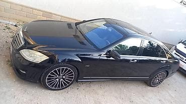 mercedes benz cl class: Mercedes‑Benz S-Class sedan (W221), qara rəng, V12 emblemli. Xarici — 2