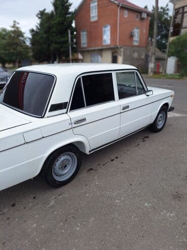 ваза стеклянная прозрачная высокая без узора: VAZ 2106 sedan - Korpus: Ağ rəng, 4 qapı, xrom ön-arka bamperlər — 5