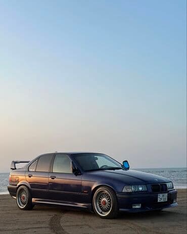bmw 3 серия 318 at: BMW 3 Series E36 sedan – dərin mavi rəngli, idman üslubunda tüninq — 11