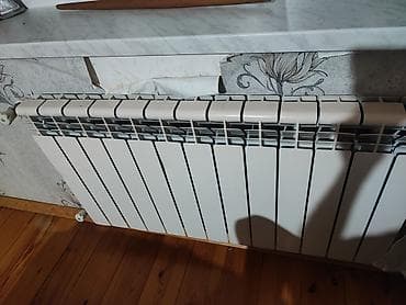 ayfon 11 pro max: Qaz kombi sistemi və radiatorlar - Marka/model: Termogas divar tipli — 3
